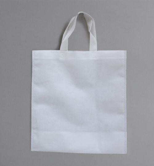 stock-photo-white-bag-on-gray-background-environmentally-concept-reusable-shopping-handbags-1581027157-transformed